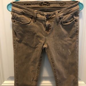 Buckle Black tan skinny jeans